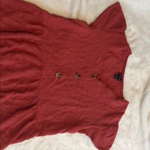 V-neck red button up shirt